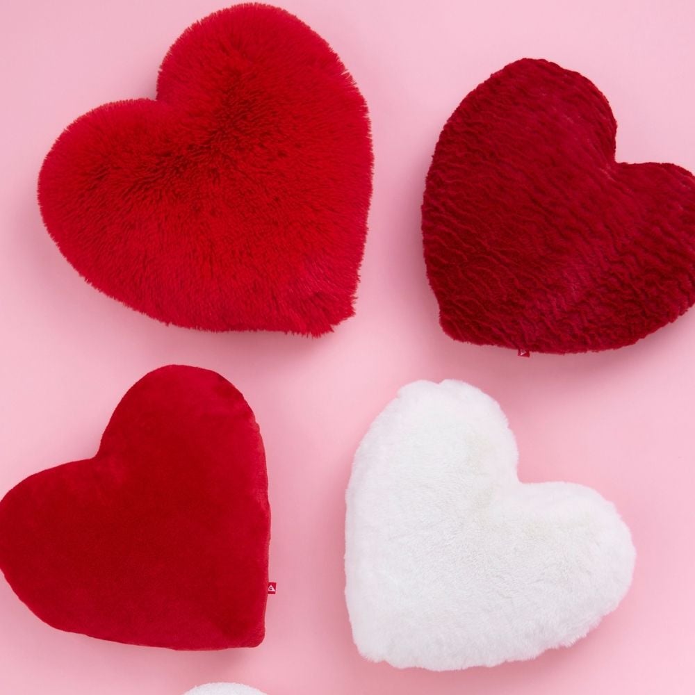 Acc&eacute;der au coussin en forme de coeur