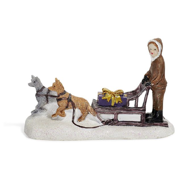 Sujet de Noël personnage sur traineau avec chien en résine