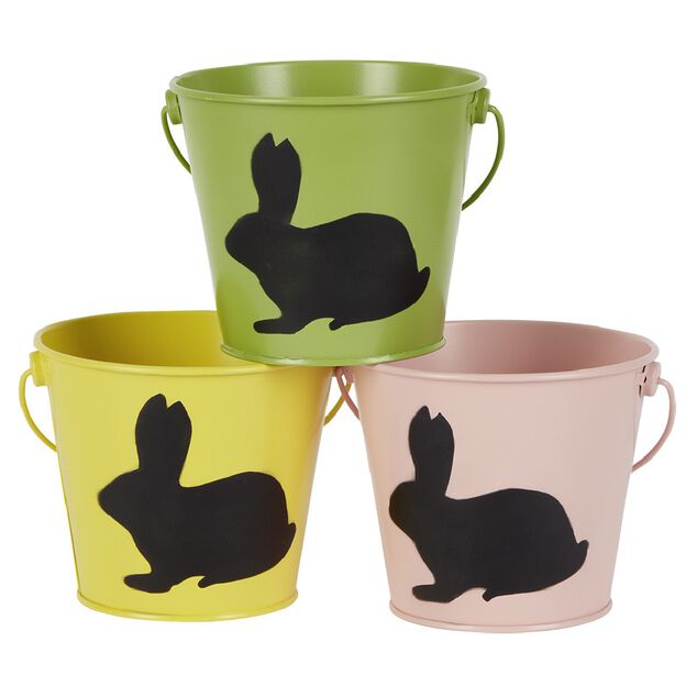 Seau en métal coloré avec une ombre de lapin