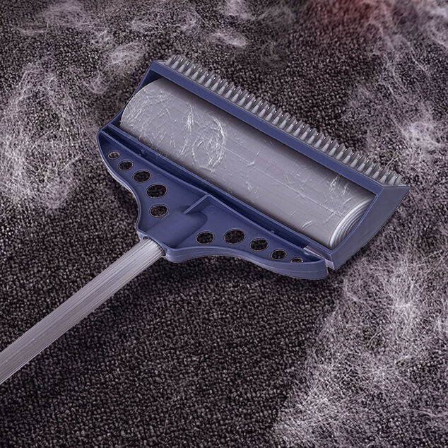 Brosse adhésive avec manche télescopique