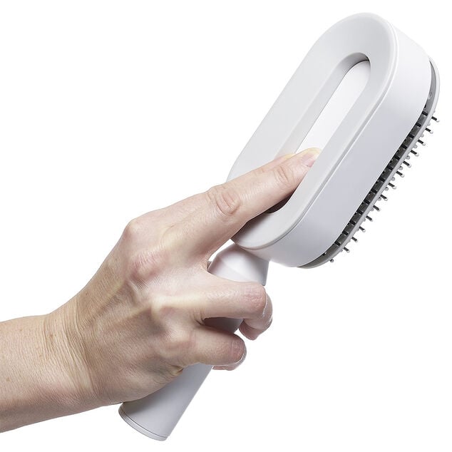Brosse &agrave; cheveux autonettoyante
