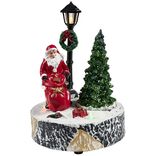 Scène village de Noël avec lanterne lumineuse