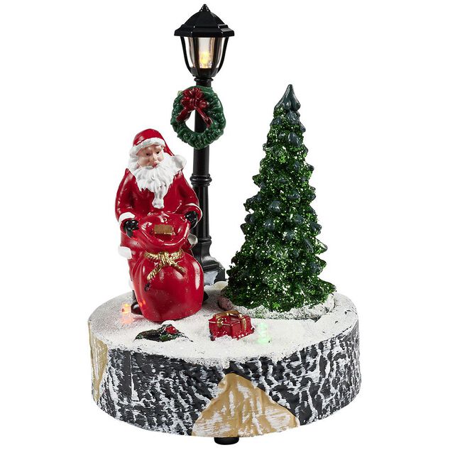 Scène village de Noël avec lanterne lumineuse