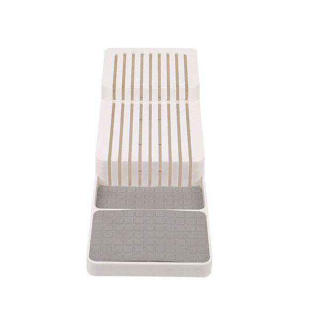 Range couteau gris et blanc