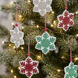 Suspension flocon en bois L14x8cm