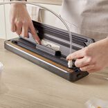 Tuyau d'aspiration pour bo&icirc;te de conservation sous vide