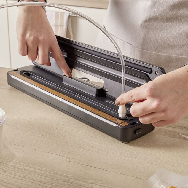 Tuyau d'aspiration pour bo&icirc;te de conservation sous vide