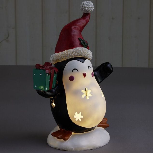 Pingouin solaire polyr&eacute;sine No&euml;l 1 LED blanc chaud H30cm