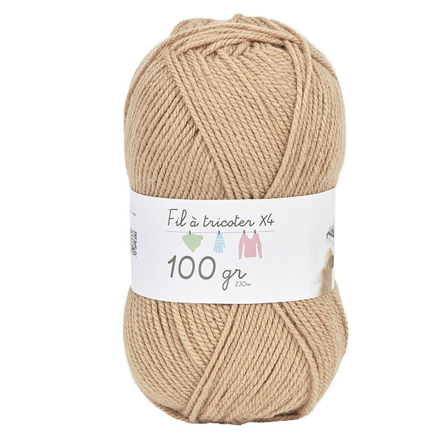 Pelote de fil &agrave; tricoter beige