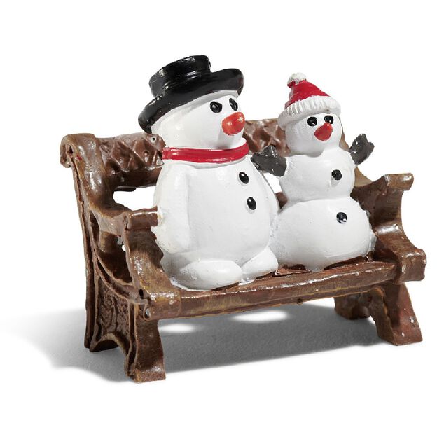 Sujet village de No&euml;l bonhomme de neige sur banc
