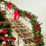 Guirlande de No&euml;l poinsettia vert et rouge 2m