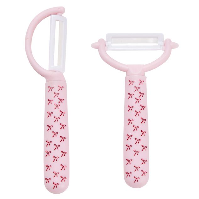&Eacute;plucheur &eacute;conome x2 lame c&eacute;ramique manche plastique motif noeuds roses