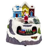 Scène village de Noël lumineuse avec train animé