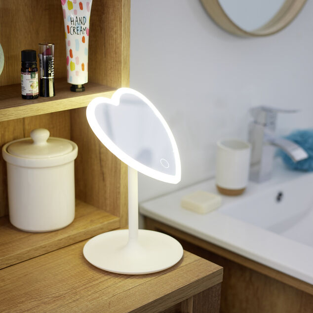 Miroir lumineux LED sur pied inclinable plastique blanc forme coeur 16xH24cm