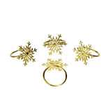 Rond de serviette x4 en m&eacute;tal dor&eacute; forme flocon de neige