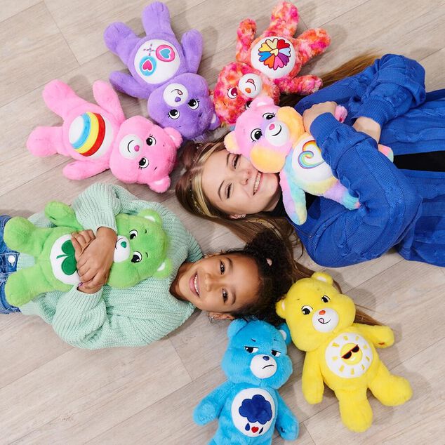 Peluche Bisounours assis multicolores 28x26xH35cm (6 mod&egrave;les)