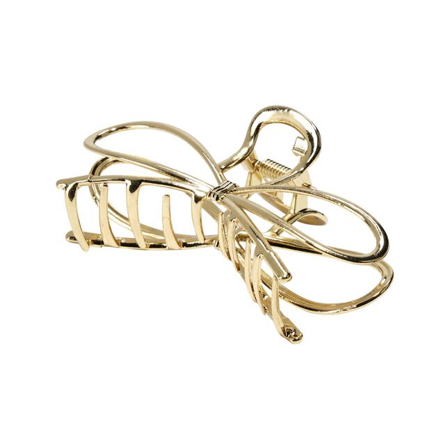 Pince à cheveux métal doré forme noeud