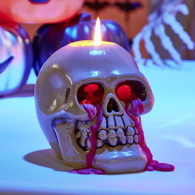 Bougie Halloween t&ecirc;te de mort beige