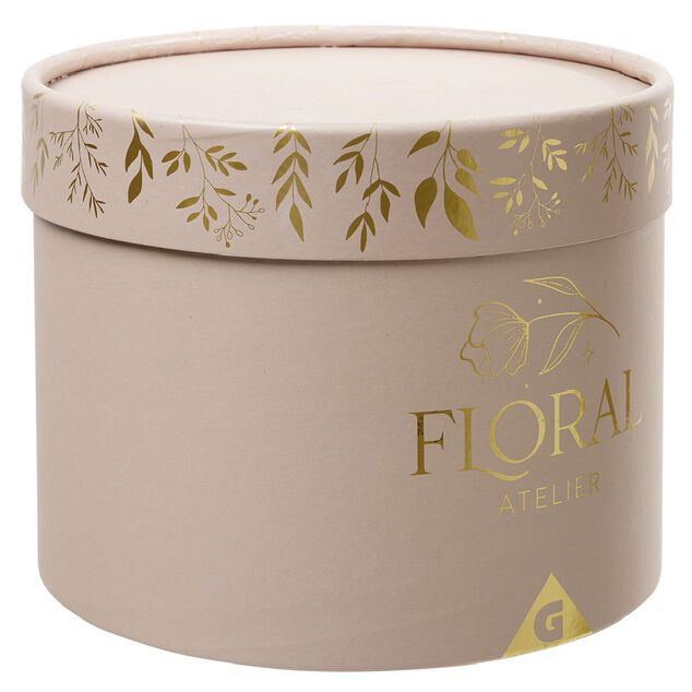 Fleur séchées dans boîte ronde rose doré