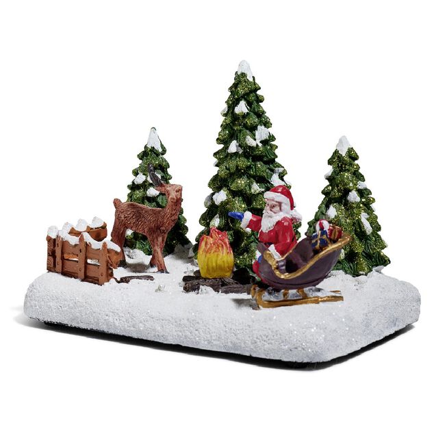 Père Noël et renne lumineux feu de bois sur la neige 4 LED en résine