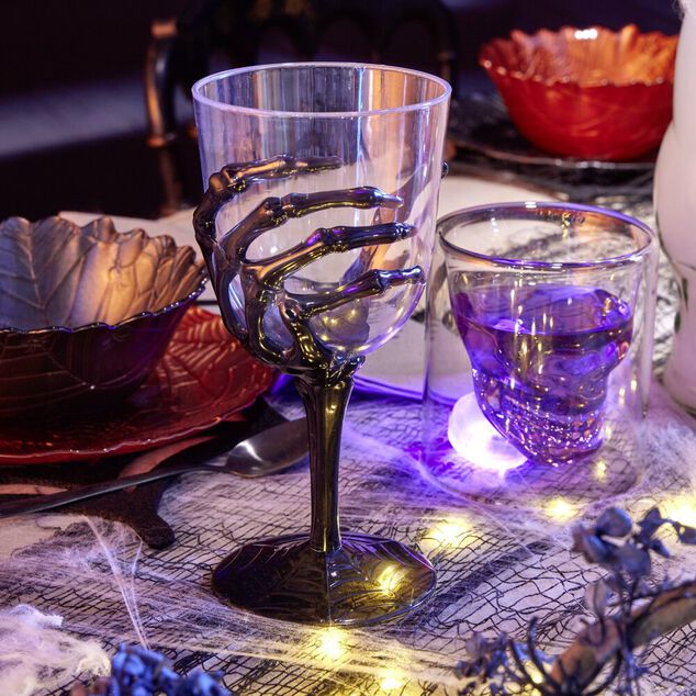 Verre &agrave; pied Halloween main squelette H18cm (2 mod&egrave;les noir ou violet)