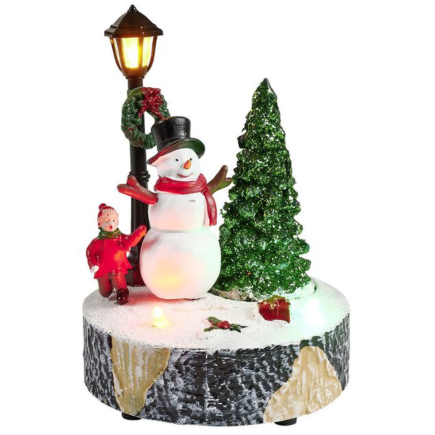 Scène village de Noël avec lanterne lumineuse