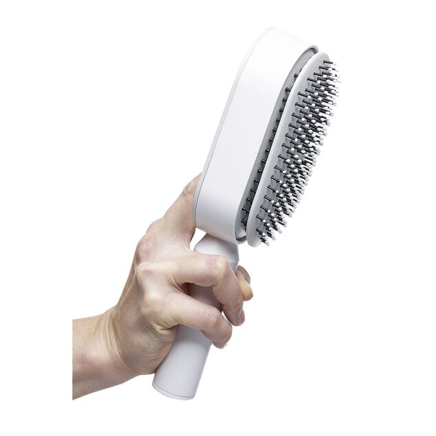 Brosse &agrave; cheveux autonettoyante