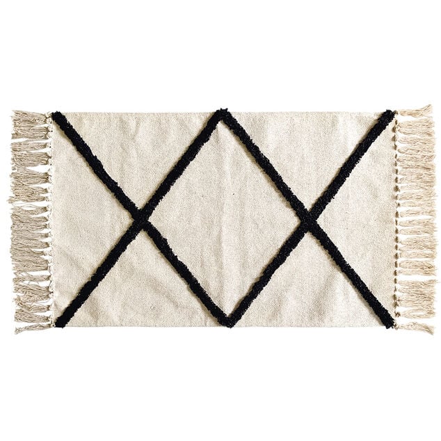 Tapis rectangulaire beige tuft&eacute; noir 50x80cm