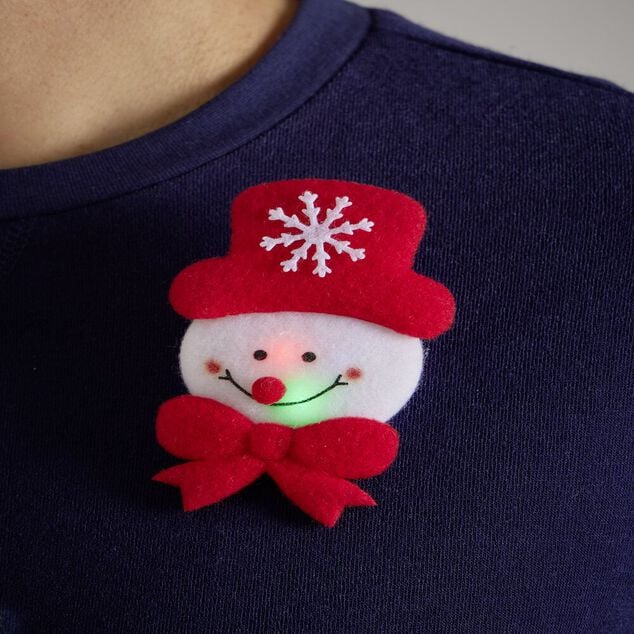 Badge lumineux No&euml;l rouge et blanc (4 mod&egrave;les)