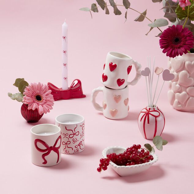 Bougie dans pot c&eacute;ramique blanc motif noeud rouge &Oslash;8xH9cm (2 mod&egrave;les)