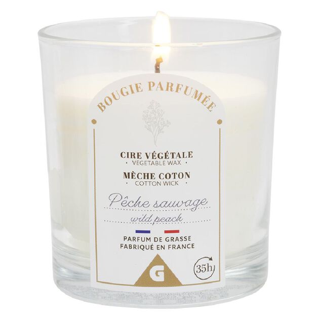 Bougie violette dans verre senteur pêche Ø7xH8cm