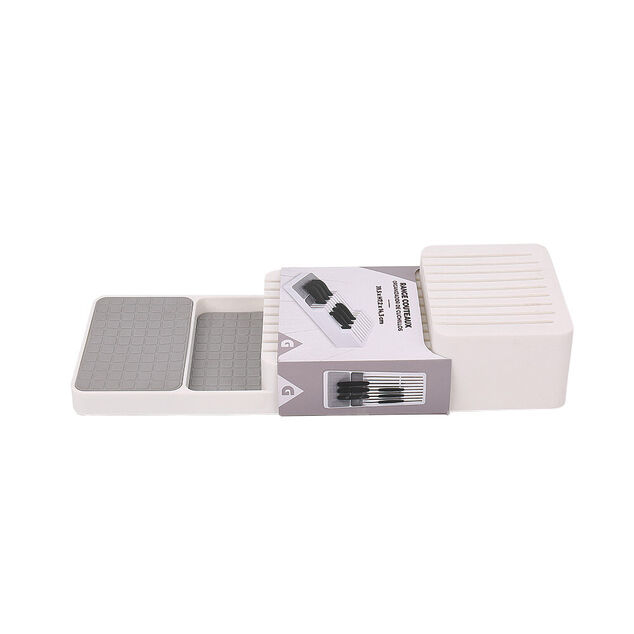 Range couteau gris et blanc
