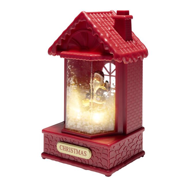 Boule &agrave; neige lumineuse sc&egrave;ne maison de No&euml;l rouge avec P&egrave;re No&euml;l 10x5x9xH19cm