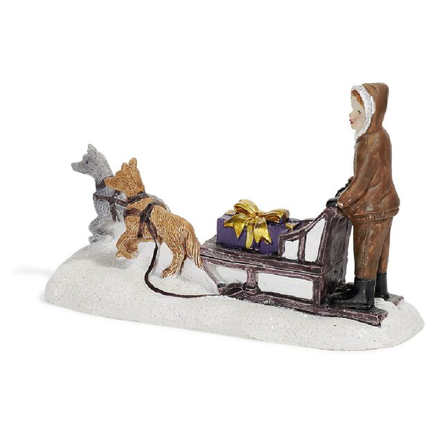 Sujet de Noël personnage sur traineau avec chien en résine