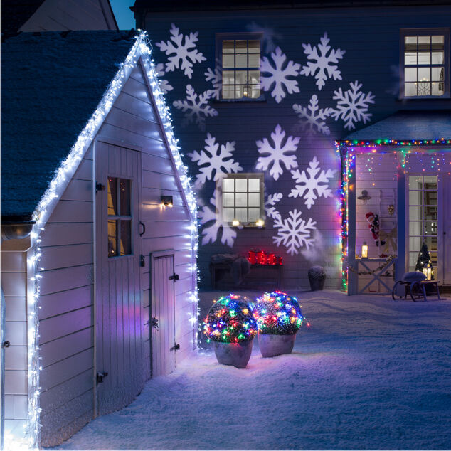 Projecteur ext&eacute;rieur LED No&euml;l motifs flocons anim&eacute;s