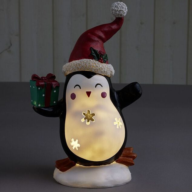 Pingouin solaire polyr&eacute;sine No&euml;l 1 LED blanc chaud H30cm