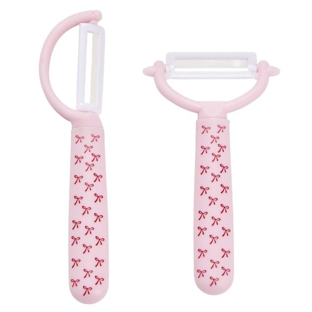 &Eacute;plucheur &eacute;conome x2 lame c&eacute;ramique manche plastique motif noeuds roses
