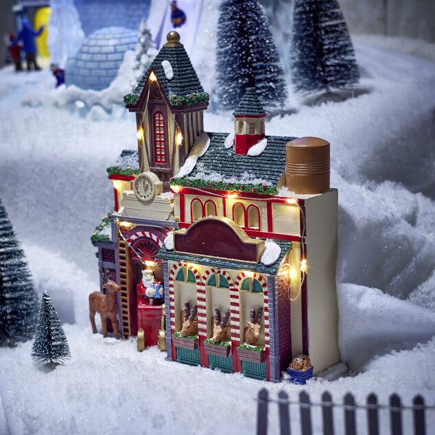 Façade étable des rennes lumineuse pour village de Noël polyrésine 26x8xH30cm