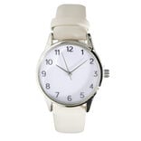 Montre femme cadran rond acier argent&eacute; bracelet simili &Oslash;3,5xH23cm (4 mod&egrave;les)